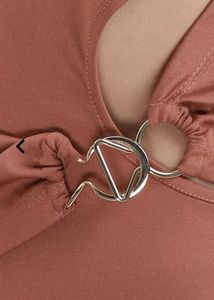 Chic Top with Ring Detail