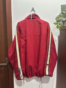 Red Jacket with Striped Sleeves