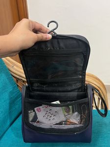 Travel Essential Pouch In Purple And Black Color