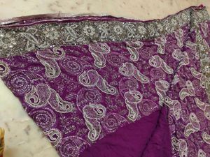 very heavy work purple saree