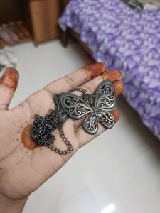 classic butterfly oxidized locket.
