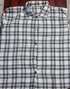 women stylish checked shirt with inner wear