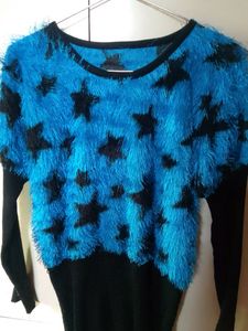 It's a partywear blue warm top 💙!