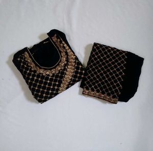 GORGEOUS BLACK AND GOLDEN SUIT