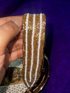 Anekaant Gold-Toned Embellished Tasselled Clutch