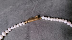 Channel Pearl Necklaces