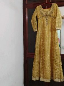 Royal Look Golden Colour Gown.