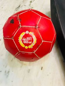 1. Plastic Cricket Bat (Black) 2. Small Red Footba