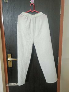 White textured wide-leg pants