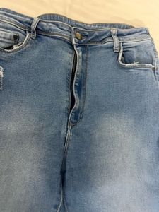 Ripped Knee Light Wash Jeans