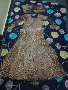 lehenga with small pipes like beads.