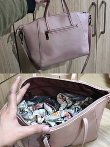 Caprese Peach-Coloured Solid Handheld Bag
