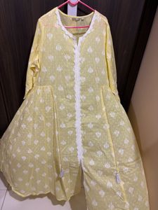 Lime Yellow  A-Line Kurta With Lace Work.