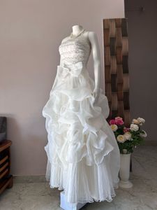 VOLUMINOUS RUFFLED ORGANZA WEDDING GOWN