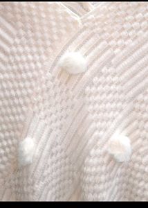 Cozy Knit Poncho with Pom Poms