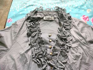 Fancy Top With Ruffle Neck Detailing Nd Buttons