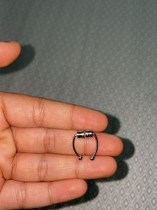 Ring and Fake magnetic septum piercing