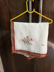 Beautifull White Colour Saree Flower Design.