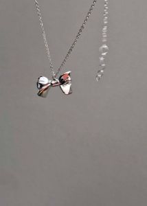 Studds And Bow Pendant Combo