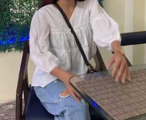 white top in thin material