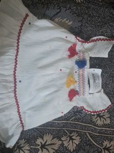 White Dress with Colorful Details