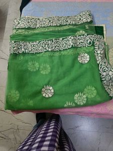 Elegant Green Net saree with gotawork border