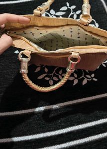 Elegant Gold-Tone Handbag