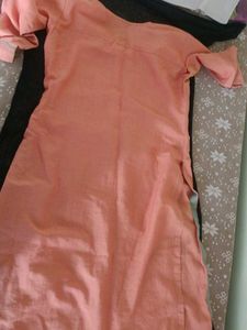 Its a orange Colour Kurta With Hand Work Design