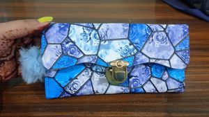 Floral Print Blue Clutch .