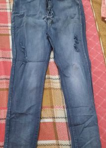 Ripped Blue Denim Jeans