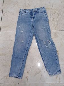 Distressed Blue Jeans