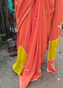 A Beautiful Orange Saree With No Blouse