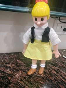 Vintage Blonde Doll with Bow