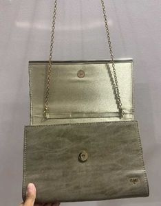 Madame Branded Clutch
