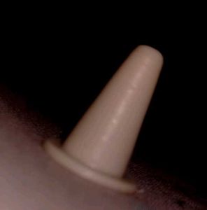 They are plastic, cone-shaped pawns
