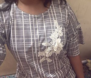 grey and white tunic