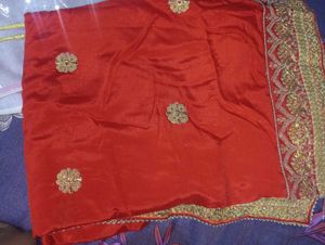Red Heavy Saree With Golden Blouse.