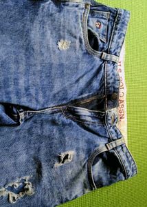 Ripped Blue Jeans