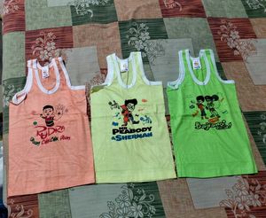 Three Baby Vests