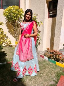 A beautiful grey lehenga with pink detailing