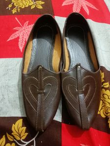 . Brown Juti Looking