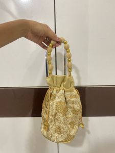 Elegant Gold Embroidered Potli Bag