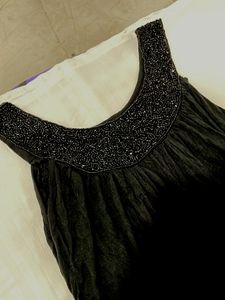 Black Party Wear Top With Shimmery Neckline