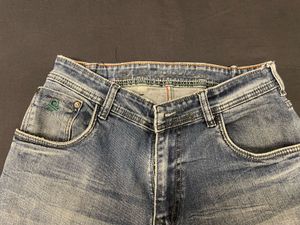 jeans in the photo have a distressed, ripped s