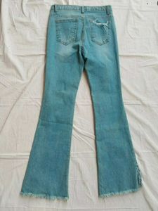 Ripped Fringe Hem Flare Jeans