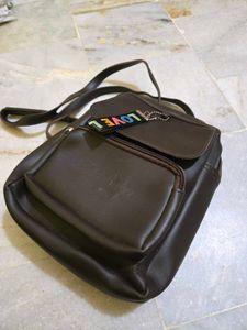 Brown Mini Backpack with Charm