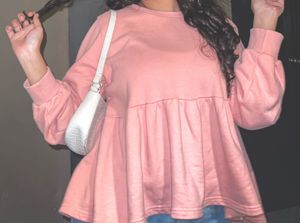 pink peplum top with jeans combo