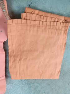 Peach colour saree with blouse and peticoat