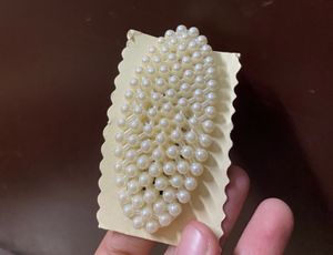 Pearl Oval Tic Tac Clip