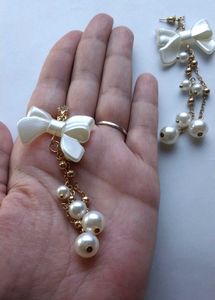 Pearl Bow Dangle Earrings